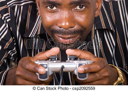 man-concentrating-on-video-game-stock-photograph_csp2092559